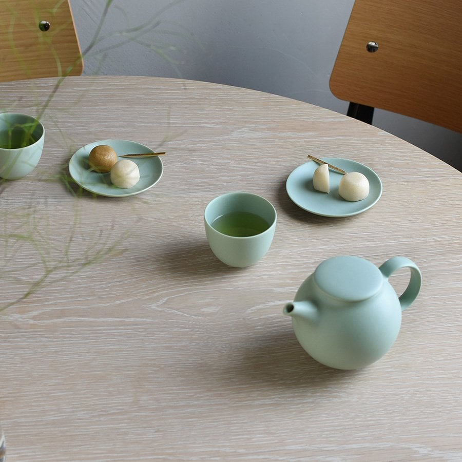 "Pebble" Cup and Saucer by Kinto moss green